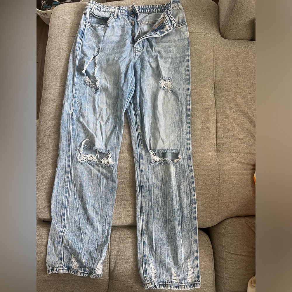 Ripped blue jeans
